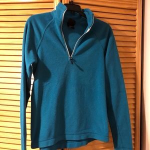 Previously worn blue fleece pullover